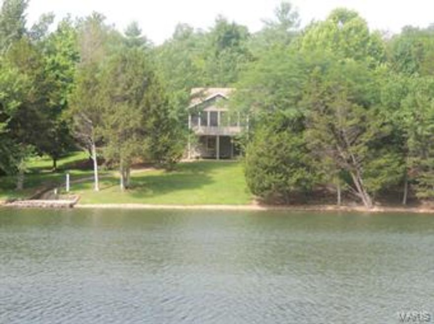 Amazing price! FABULOUS LAKE HOME in Innsbrook! Spectacular views of the water. Enjoy fishing from your very own private dock on a 7-acre lake. The large screened porch is the perfect spot for reading or enjoying time with family and friends. This 4-bedroom, 5-bath home is so welcoming. The kitchen is spacious & functional, a chef's dream, with new stainless steel appliances, Adura WOOD floors and quartz counter tops. Beautiful cabinetry adds to the charm of this amazing space. The great room, complete with hand-scraped wood floors and beautiful wood ceilings, the picture window illuminates the lake view. A gorgeous gas stone fireplace can be enjoyed from the great room and the kitchen. Built-in bookcases are a nice addition. Great closet space. MFL. Lot offers plenty of privacy, fabulous landscaping, terraced gardens and a dock. Many upgrades! Extremely convenient location, just two minutes to the main gate. This home is very well cared for. New pool/recreation complex coming 2016!