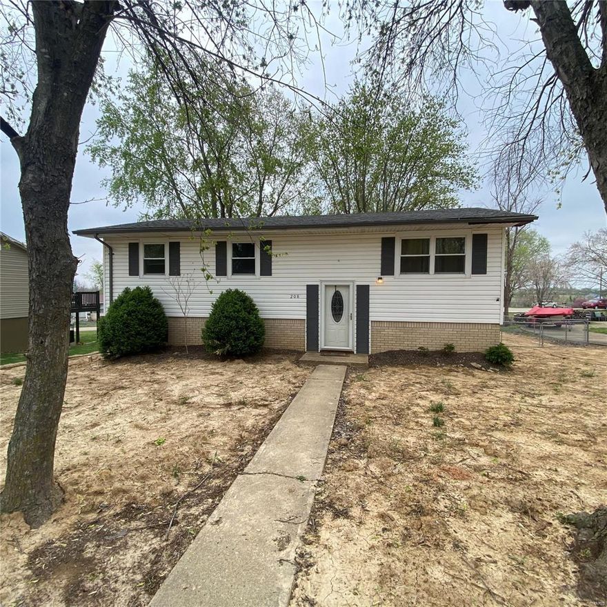 Charming split level home with Endless Potential!  Welcome to this inviting 3 bedroom, 1 bathroom home nestled in a quiet, established neighborhood.  This Split-Level gem offers a spacious kitchen with ample cabinetry and counterspace- perfect for family meals or entertaining.  The Main living area features natural light and a functional layout ready for your personal touch.  Step outside to enjoy a large, fenced in yard offering plenty of room for kids, pets and future landscaping projects.  The exterior boasts low maintenance vinyl siding.  Weather your a first time home buyer or looking for a solid investment opportunity, this property delivers both comfort and Value.  With a little TLC this home can truly shine.