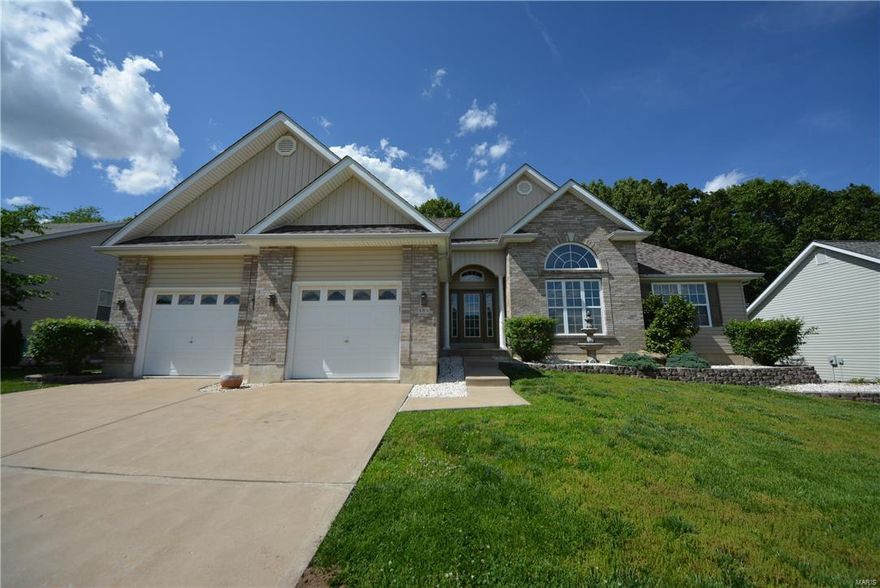 WELCOME HOME! Beautiful, MOVE-IN-READY 4BR 3.5BTH ranch w/3700+SF of living space! Nestled on .28 ac this home boasts great curb appeal w/vinyl & brick front, lush landscaping & 2 car garage. The interior inspires w/an open floor plan & architectural details throughout. Walking in the alluring entry foyer you'll notice the elegant dining rm w/stately columns. The spacious great rm features a gas FP surrounded by windows. You'll love the eat-in kitchen w/custom cabinetry, granite countertops, bkft bar, stylish black appliances, pantry & bkft rm w/slider to the patio & the lvl, tree-lined backyard, perfect for outdoor enjoyment. Luxurious vaulted master suite offers a HUGE walk-in closet & deluxe BTH w/dual sink vanity, soaking tub & shower. 2 add'l BR, 1.5 BTH & laundry on main. The LL lookout is ideal for entertaining or an in-law suite w/a large rec rm, wet bar, family rm, kitchenette, sitting rm, 4th BR & full BTH. Located in the top rated Wentzville School District! A MUST SEE!