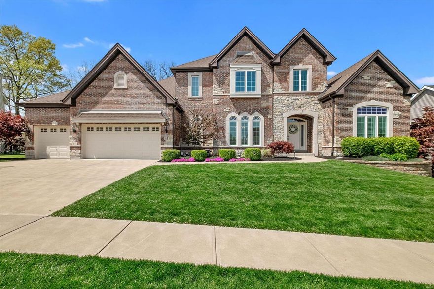 This elegant 1.5 story Hayden built home will impress you upon entering the grand 20' foyer w/hardwood flooring, custom millwork, plantation shutters, & tons of windows all throughout! Gourmet kitchen w/ massive center island, 48" Thor gas range, custom staggered cabinetry w/ a built in stainless refrigerator, under cabinet lighting, & butler's pantry w/wine cooler. Breakfast room w/ bay window & hearth room, or step outside to the beautiful private patio w/a pergola & professionally landscaped yard. Main floor master suite w/coffered ceilings, a luxurious bath, 2 walk in closets w/ barn doors & custom shelving. Other features include family room w/wb fireplace, formal dining room, office w/french doors, MFL w/2 hook ups & wash sink, drop zone w/desk, oversized 3 car garage, 3 additional bedrooms all w/ private baths & walk in closets & loft area on the second level. The lower level has a media room & plenty of space to add your finishing touches!