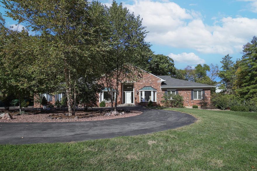 Custom built, all brick ranch home on a beautiful 1.27-acre lot, with mature trees, in the private, gated Hickory Woods Subdivision, the heart of Town and Country! Top-Rated Parkway West – Mason Ridge Elementary! This 4 Bedroom, 7 Bath (4 Full / 3 Half) home with over 7,600 Sqft of living space, has been freshly painted, in stylish neutral colors, to show off its architectural details. From the moment you walk into the Foyer, you will appreciate the open floor plan this home offers, and know you are home! Additional features include: gorgeous Great Room, gourmet eat-in Kitchen, spectacular Main Floor Master Retreat, professionally finished walkout Lower Level, beautiful hardwood floors, 2-zoned HVAC, a circle drive, an oversized, (heated and cooled) side entry 3-car with 16’ ceilings, and professional landscaping - just to name a few! Relax outside in your private park-like setting, on one of the expansive decks, down by the stone fire pit, or take a stroll through the neighborhood. Additional Rooms: Sun Room