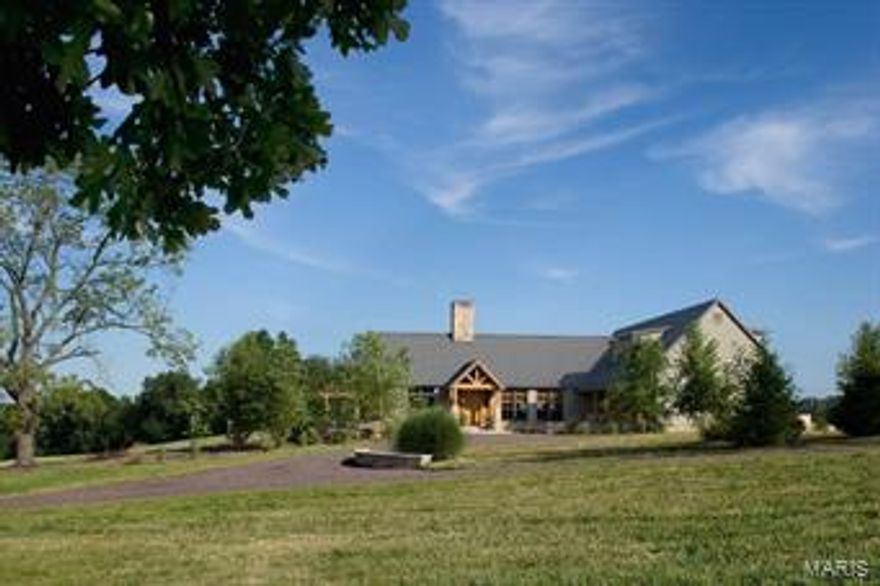 StoneyCreek Ranch is a private country estate spanning 264 acres of rolling hills, a 10 acre lake, 2 ponds & a rustic Montana style home w/ pool overlooking the grounds & an hour drive from the heart of St. Louis,. The property has its all--fishing ,hunting, horses, cattle or just a place to enjoy the beauty of the surroundings. There are 2 barns, a boat dock, an enclosed gazebo, & a fully stocked lake. Upon entering the 3500sq ft. home one notices wood floors, stone walls, vaulted ceilings w/striking beams. A dramatic stone fireplace stretches from floor to ceiling & the windows around provide stunning views. The dining room & kitchen are open & have the same sophisticated country feel w/ wood & stone high end finishes. A screened in porch w/ fireplace opens to the terrace & pool. The master suite is on main floor w/ 2 bds/ba upstairs. Lower level is great entertainment space w/pool table, fitness room and more. Additional Rooms: Mud Room, Sun Room