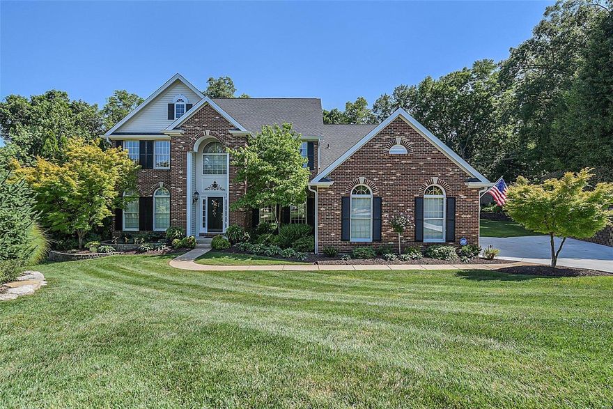 Welcome to this single-owner, quality-built, 1.5 story located in the award winning Kirkwood School District. Nestled in the heart of Des Peres, this home is close to shopping, dining, recreation and major thoroughfares. From the moment you enter this home, you'll notice the hardwood floors, beautiful millwork and eight foot doors.  The two story great room boasts a wall of windows and gas fireplace, and the luxury kitchen features stainless appliances, custom cabinets and a center island big enough for any gathering; all leading to a cozy, vaulted sunroom. The main floor master features an updated bathroom and large walk-in closet. Upstairs are 3 bedrooms, 2 full bathrooms and an open flex space that could be used as a playroom, office, or living space. The walk-out basement features a large rec-room, office, gym, sleeping room, full bathroom, bar and wine cabinet. Be sure to enjoy the best backyard in Des Peres with two patios and a hot-tub!