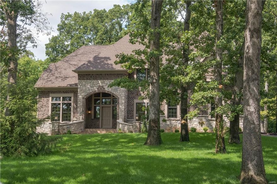 This home is ready for move in! See Virtual Tour. Spectacular new home by Simon Homes, providing years of experience building homes in the St. Louis, w/ superior materials & craftsmanship. 10 yr Simon ltd warranty.  For limited time, home is being offered w/ BUYER INCENTIVE $10,000 UNION BUILDER CASH at CLOSING. Beautiful 1+ area level wooded lot with room for a pool. Many upgrades & special features are included in this home!  A few of the quality features include; gourmet kitchen w/ Subzero fridge. Huge hearth room w/ vaulted ceilings & fireplace.  Main floor master (coffered ceilings) w/ luxurious bath. 10-ft ceilings on the first floor, 9 foot on the 2nd floor. Dining room with sculptures ceilings and 3 piece crown. Crown moulding in the entry foyer & library. Brick on 4 sides. 3 car garage. Basement w/ a deep pour & full bath roughed in. Great location, easy access to Highway, airport, hospitals. Call for a list of truly superior custom features that are included in the home.