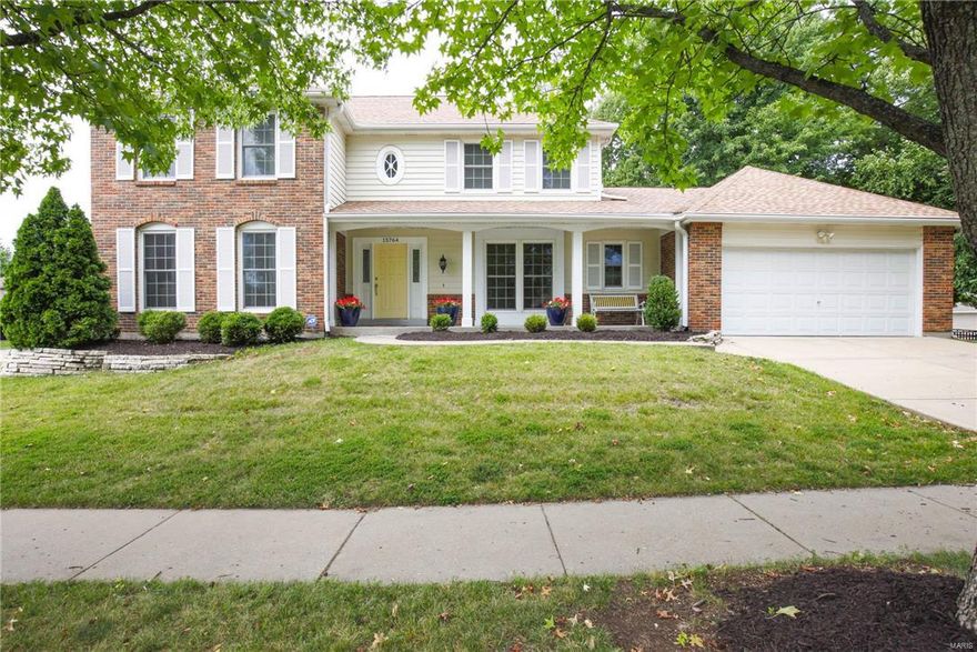 Beautiful curb appeal is merely the beginning of this welcoming UPDATED home on a fantastic fenced level lot in The Villages at Baxter Ridge. Enter into your move-in ready home featuring; 2 story foyer, neutral decor, crown molding/custom millwork, gleaming hardwood floors, pella windows, full masonry WB fireplace and desired open living room. Gorgeous center island kitchen, granite countertops, soft close cabinetry, ss appliances & picture window overlooking the beautiful backyard. Spacious laundry w terrific built-in storage! Roomy master bedroom features walk-in closet, bath w double sinks & sep tub/shower. Three additional bedrooms & full bath complete upper level. Pleasant outdoors w mature trees, gutter guards, oversized downspouts, and an abundance of patio space! Bonus retreat 1 tenth a mile from home to Pool, Tennis Courts, Clubhouse featuring game room & full kitchen! Attractive location, easy access to Hwy 40 as well as Chesterfield Valley shopping & restaurants.