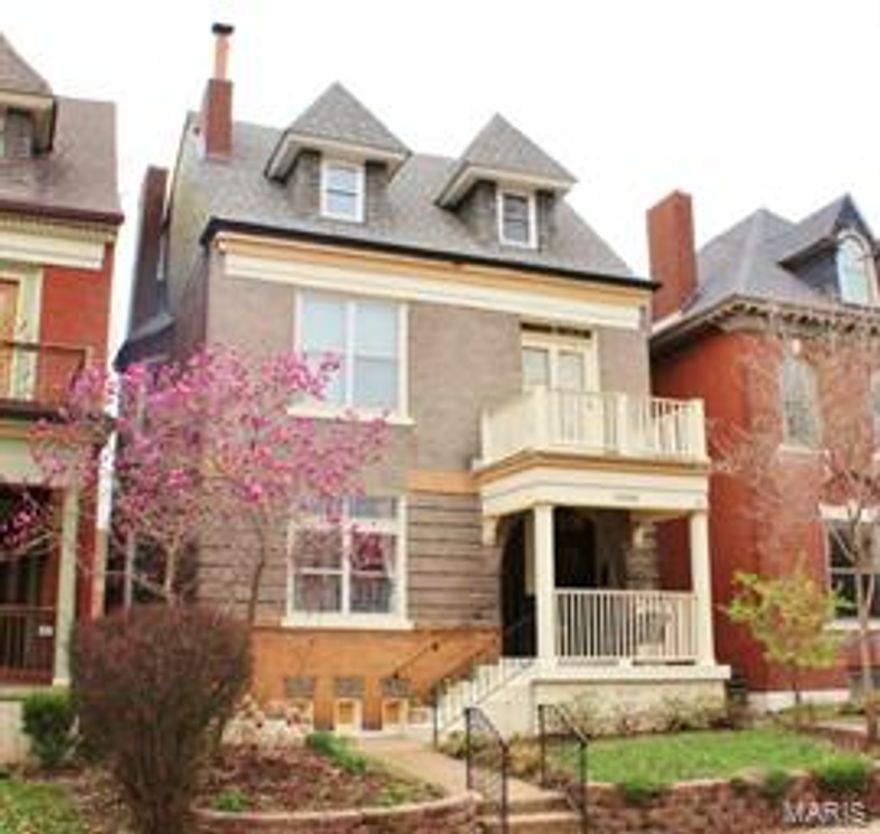 Welcome to 4208 Cleveland a great home in Shaw on a cul-de-sac with over 3000 square feet of high end living space.  Covered porch with tiled floor, wood paneled walls & ceilings, arched brick and swing.  First floor has a living room with pocket doors, fireplace and leaded glass window.  Lovely formal dining room with bay window, chandelier, fireplace and built in shelving.  Updated full bath. Family room with a pass through to the kitchen.  Updated kitchen with custom cabinetry, pantry, granite counter tops, framed in refrigerator and stainless steel appliance package. Covered back porch overlooks a nice patio, garage and private fenced yard. The second floor has three bedrooms, three fireplaces, a sitting room, laundry, great room, renovated bathroom, balcony and office. Top floor has two more large bedrooms. Zoned heating and cooling.  Hardwood floors throughout home.  Full basement.  Two blocks from Tower Grove Park and steps from the Botanical Gardens.