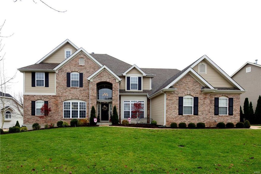 This 1.5 story is loaded with custom features! The dining rm boasts a coffered ceiling with crown molding, custom light fixture, chair rail and box/bay window. The front office/den has an elegant cased arched opening and crown molding. The heart of the home is the extended kitchen with wood floors, vaulted ceiling, 42” cabinets, granite countertops, custom tile backsplash and double ovens. Adjoining the kitchen is the breakfast rm and the sun rm. The extended great rm offers a wonderful place to relax with a gas fireplace, box/bay windows and built-in cabinets. The Master bedroom suite has His & Her walk-in closets, double vanities with make-up area, oversized shower and Jacuzzi tub. Upstairs you will find a generous loft and 3 additional bedrms with private, full bathrms. The lower level provides rough-in plumbing for a future bathrm and ingress/egress window for future bedrm. Additional features include: 3 car side entry garage, sprinkler system, patio, sun room and much more! Additional Rooms: Sun Room