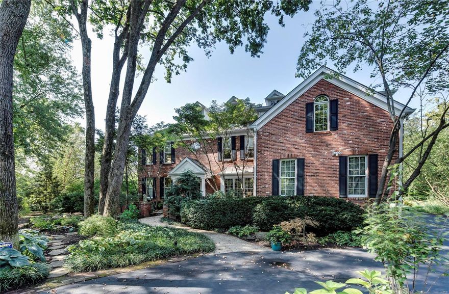 Set in an extremely private space, off a single lane drive, this Ladue home off Conway Road was built by Ellerman to be both functional and efficient. As an offset to any flood plain issues the house was built with no basement and a 3rd floor was added instead, ideal for a gym, studio, office or additional living space with natural light. Convenient to all goods and services Ladue has to offer, including the best schools, both public and private. The home provides an open floor plan and fresh finishes. The main suite enjoys a recently remodeled bath, dual vanities, separate shower and a jet tub. Three additional bedrooms are found on the second level. The eat-in kitchen is outfitted in Viking appliances, granite, and glass front cabinetry. A renovated all-season room provides views of dense private landscaping. The Living Room is two-story, and has the feel of a Colorado lodge. Main level office, garage and laundry. Conway Elementary, Ladue Middle, and Ladue Senior High School.