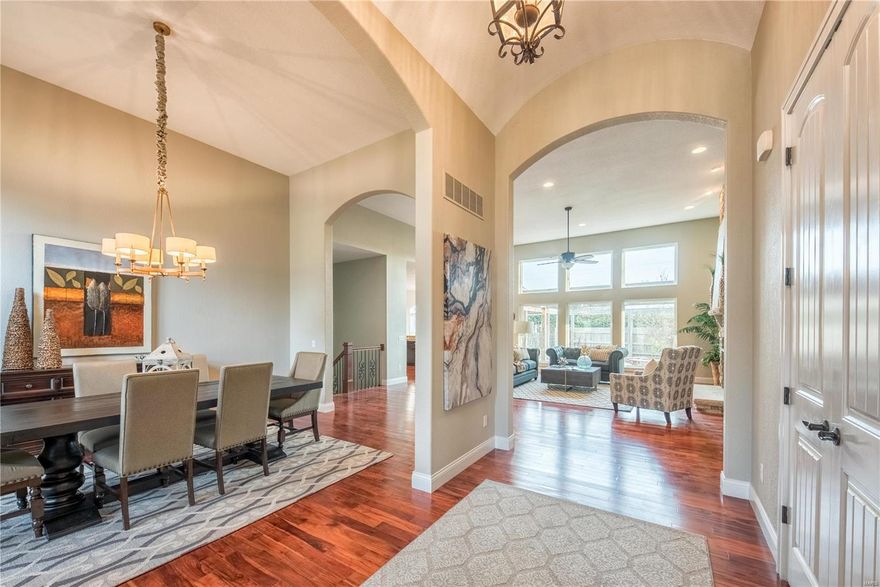 How can a house with 6000+ square feet still feel warm and intimate? See for yourself at this thoughtfully designed brick & stone ranch in Des Peres! You'll be greeted by a barrel ceiling foyer, Asian Walnut floors, soaring stone fireplace, 13-foot ceilings, and a wall of windows overlooking a charming flagstone courtyard. The custom kitchen features cherry cabinets, granite counters, a large center island and stainless steel Bosch appliances. There's also a sunny breakfast nook, main floor laundry nearby, and a bonus family room tucked away. Every bedroom here has its own full bath, and the master is especially lovely, with direct access to the perennial gardens outside. The open staircase in the living room leads to a spacious lower level with family room, exercise room, ample storage + 2 bedrooms/2 baths. Just off the foyer, there's also a private office with built-in bookcases and amazing natural light. Seriously, what a WOW! Come and bask in the glow of this very special home! Additional Rooms: Mud Room