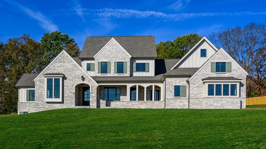 Welcome to your dream home!  This stunning 4 bedroom, 6 bathroom, 1.5 story with 4 car garage estate features exquisite craftmanship, panoramic views, and high-end finishes throughout.  This inventory home is one of 18 luxurious homes nestled on 26 acres.  Experience the best in luxury living, where elegance meets nature.  Stunning custom home with brick & cut stone front, set on a private 1.04 acre lot, in a gated community.  Features a concrete driveway & patio, screen covered front porch & architectural shingles.  First floor boasts 10' & 9' ceilings, while the primary suite offers coffered ceilings, his & hers walk in closets, & luxurious private bath.  Enjoy Bosch appliances, 42" wall cabinets with crown molding, quartz kitchen countertops, a walk in pantry, gas fireplace, 400 AMP electrical service, Pella windows & doors off the dining & breakfast room and a four car garage.  Schedule your private home tour today! Duplicate listing 24070196.