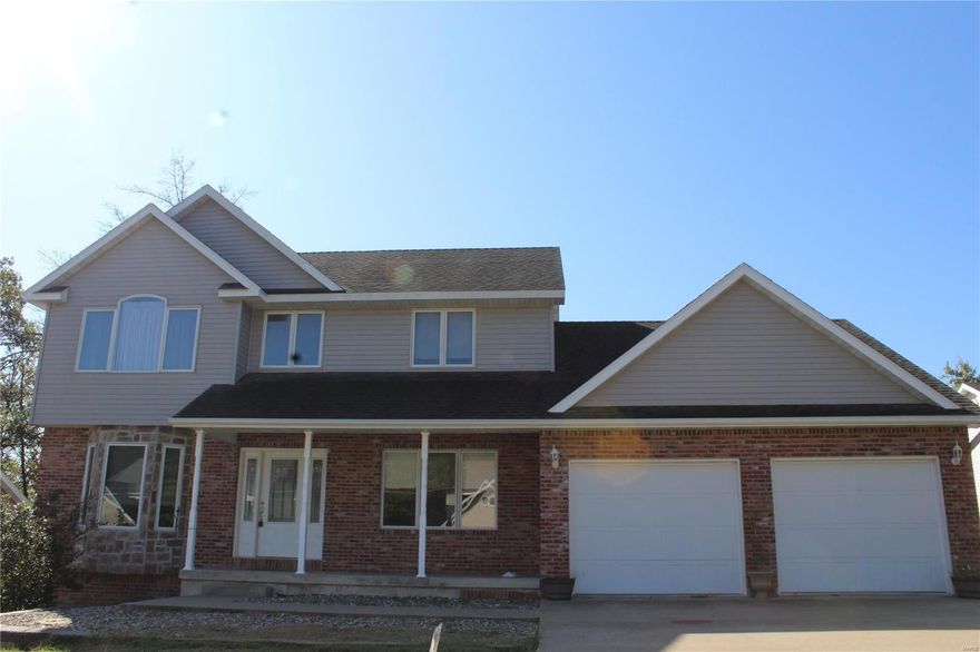 Price Reduced! Beautiful two story home located on a dead end street.  Great place to let the kids play without the worry of through traffic.  The main level features a large living room, formal dining room or office, and a spacious kitchen that is great for family dinners.  The laundry room and half bath, finish off the first level.  Make your way upstairs to find two bedroom and full bath.  Then open the door to the master suite large enough for a sitting area.  The master bath has a Jacuzzi tub, stand up shower, double sinks and a walk in closet.  Now venture down to the finished basement.  There is a sleeping room, full bathroom, large family room, and extra space for your ping pong table or other games.  There is a storage room that walks out to the patio.  Call today to see the value that awaits.