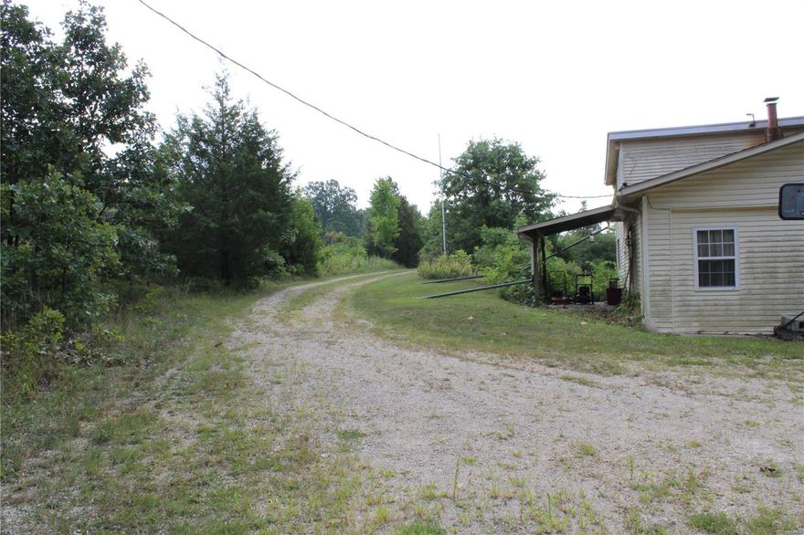 This could be the farm you have been looking for! 30 acres +/- located just minutes from town. The property is fenced with separated pasture land. There is plenty of room to store your farm equipment in the large shop building. Equipped with electric, concrete floor, and a lean-to. The home/cabin that sits on the property is 2 bed 1 bath and 1,440 sqft. It includes appliances in the kitchen, a large laundry/utility room with a washer and dryer. separate dining area, and a master bedroom with plenty of closet space in the loft. This unique property has a great location with lots of road frontage to both Madison 217 and Madison 9284.