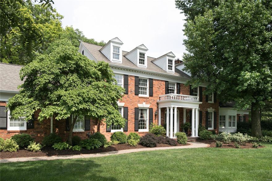 SPECTACULAR NEW LOOK & NEW PRICE! This 5-bedroom home is nestled in a premier gated community in Town and Country. Special features too numerous to mention; highlights include exceptional mill work, 9+ ft ceilings and a lush 1.3-acre lot. The kitchen features stainless appliances, granite counters and lovely adjoining breakfast room. The classic, paneled family room has built-ins, wood burning fireplace, wet bar, and overlooks pool & patio. Main floor master suite features a gas fireplace, large bathroom & walk-in closet. Upstairs, 4 additional bedrooms are spacious and welcoming, with walk-in closets. The finished lower level is made for entertaining, with rec room, half bath & two bonus rooms perfect for media room, workout or additional bedroom space.  With its lovely terraced patio and updated saltwater pool, the professionally landscaped grounds will impress. Large main level laundry/mud room, 3-car garage & Parkway West schools complete this irresistible property.