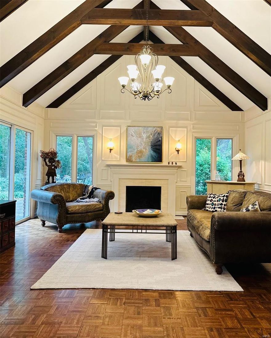 Custom built, superb quality.Light,bright and airy! Sheltered by stately mature trees and Gorgeous lot,This magnificent 1½ story home is on one of the premier streets near the Mason & Ladue roads. !This spacious mostly brick updated home has a grand feel both in the approach & the interior space. Distinguishing features incl. the entrance foyer with statement staircase, richly appointed family room with spectacular millwork, cathedral ceilings & large windows that overlook the a fabulous entertaining patio & lush level grounds. This fine home skews both traditional & modern with a bright island kitchen, stainless appliances, & built-in breakfront for add'l storage. 3 full and two half  baths.FIRST floor primary suite offers a  luxury bubble bath & steam shower.4 large bedrooms on the second. Fun, finished lower level w/ sewing studio & rec room.  3 car garage.Mostly wood floors throughout & immaculately cared for. Ideally located near schools, clubs and parks. Convenient to everywhere!