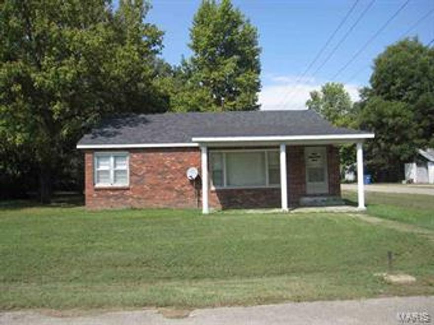 Adorable 2 bedroom, 1 bath , brick home located in Fisk. Home has original hardwood floors, covered carport with storage and shed.