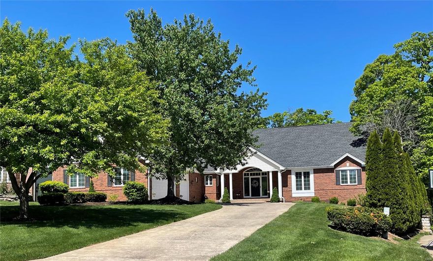 Magnificent WATERFRONT with INGROUND heated POOL! Almost 7000sf of living space in this atrium ranch on a large wooded lot with terrific views of the lake! HUGE room sizes make entertaining a pleasure and this kitchen...OH MY! Cream cabinets with quartz countertops, double ovens, center island, pantry plus additional butler pantry, desk and bar area, specious dining area, adjoining sun room walks out to screen porch! Maintenance free deck for grilling overlooks the privately situated inground pool with jetted tanning pool! Covered patio for shady relaxing! Float and watch the boats go by or walk down to your own private dock and boat lift! Interior boasts two massive see thru FP separating great room/dining room and in the lower level family room/billiard room. Tiled pool room, 3 true master suites in the 6 total bedrooms, updated bathrooms, additional bonus flex room and large holiday closet! Unfin storage area, VERY oversized 3 car side entry garage.  Well cared for and maintained!