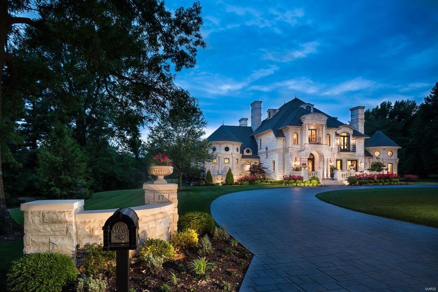 Resplendent. A World-Class Residence crafted in hand-chiseled Wisconsin & Indiana limestones on 2.2 majestic acres, built to exacting standards with opulent finishes. 5 en-suite BDs, 10BA/16,200 total SF. Extravagant, elegant, yet singularly functional w/ advanced technology. Resort lifestyle w/Pool, Spa & pristine grounds. 2-lane AMF Bowling Alley, Sports complex, Fitness Center, Techno Club & lighting systems, 7-Car heated garage w/stamped concrete drive. Detailed in marbles, natural stones, glazed woods, gold-plate, multiple SubZero beverage centers, 2 full bars, marble inlays, coved, tray & boxed ceilings. French doors, balconies and terraces throughout. Main Level Master Wing, w/Spa bath, steam shower room & heated floors. A gourmet kitchen boasts 3 integrated SubZeros, 8 SubZero drawers, Wolf range/ovens, granite island & Butlers pantry. Lavish Great Room, Hearth Room & casual Family Room. Geothermal, 100KW-Generator & Full Security. A breathtaking work of Art. Beyond words.