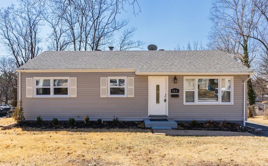 This beautifully renovated 3 bed/2 bath ranch home has it all:  from the new open kitchen to a second full bathroom you are bound to fall in love!  The bright white kitchen flows into a freshly painted living and dining space with gleaming wood floors.  You will love the neutral finishes and flooring throughout.  Every detail has been done with attention and care.  The partially finished basement is expansive with plenty of room for family lounging, gaming space - whatever you like! The spacious backyard and wood deck are perfect for family fun.