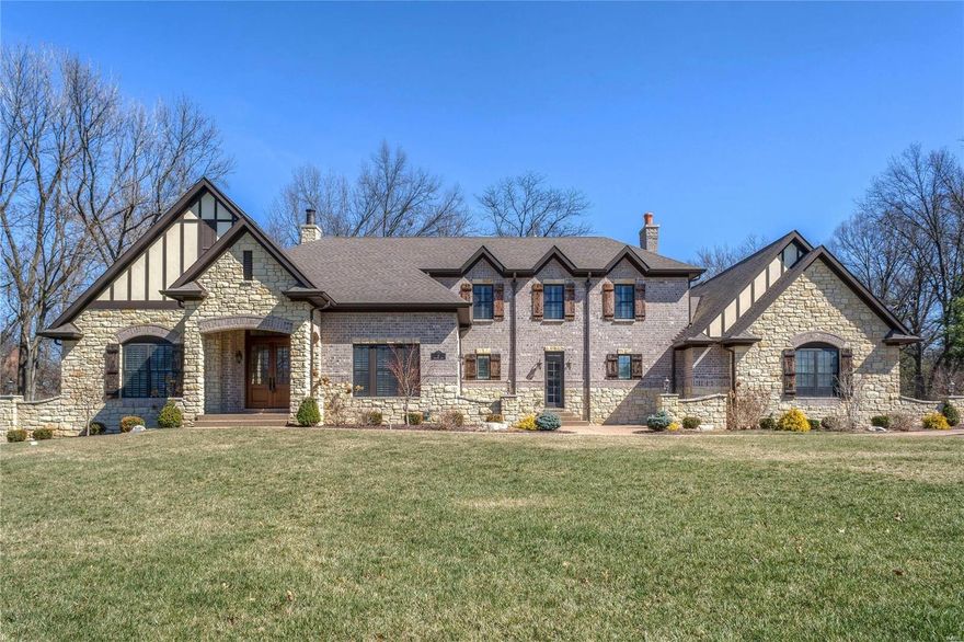 Magnificent European-styled Estate home features over 8000 sf of living space enhanced by wide oak plank flooring, arched entryways, elaborate millwork & 10' ceilings! Vaulted hardwood entry foyer leads to library-paneled study, elegant dining room & spectacular great room with 11’ box beam ceiling, granite fireplace & bank of windows. State-of-the-art kitchen with Carrara marble countertops, extensive cabinetry, commercial grade appliances, 10’ x 5’ center island & butler’s pantry adjoins breakfast room with wide bay window & hearth room with floor-to-ceiling stone fireplace. Coffered master bedroom suite with huge walk-in closet & marble bath with Kohler air tub offers an appealing retreat. The 2nd floor extends the living area with 3 additional bedroom suites, bonus loft room & family room. Incredible Lower Level includes recreation room with gathering bar, media room, workout room, wine room, 5th bedroom & 1 ½ baths. Situated on a tree-lined 1-acre lot with 2 patios & 4-car garage. Additional Rooms: Mud Room