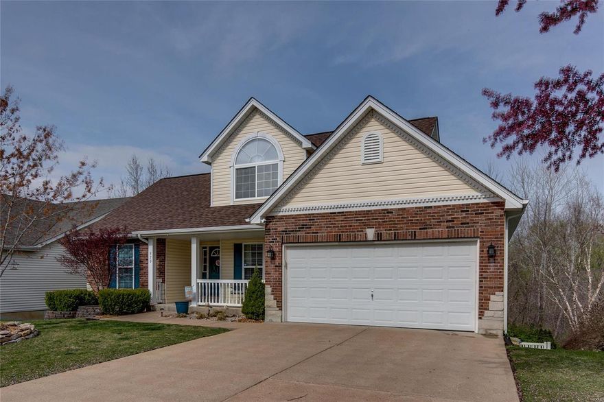 Fabulous 1.5 story updated home in the desirable Winter Lake Estates!  Offering 4 BR/3.5 BA & 2 Car Garage! The covered front porch welcomes you into the open floor plan & leads you into the amazing 2 story great room boasting wood floors & loads of natural light! The eat-in kitchen is open to the great room with quartz countertops, stainless steel appliances, beautiful cabinets & pantry! The Main Floor Master Suite features crown molding, walk in closet, luxury bathroom w/double sinks, linen closet & walk in shower. A separate dining room and main floor laundry complete the main level! The upper level features 2 bedrooms and a full bathroom! The walk out LL adds additional space with a family/rec room, gas fireplace, bedroom, full bath, & loads of storage space! Off of the kitchen walk out to the incredible deck & fenced yard (2021 $40K+) and enjoy the views backing to trees! Convenient to Gravois Bluffs, Hwys & much more!