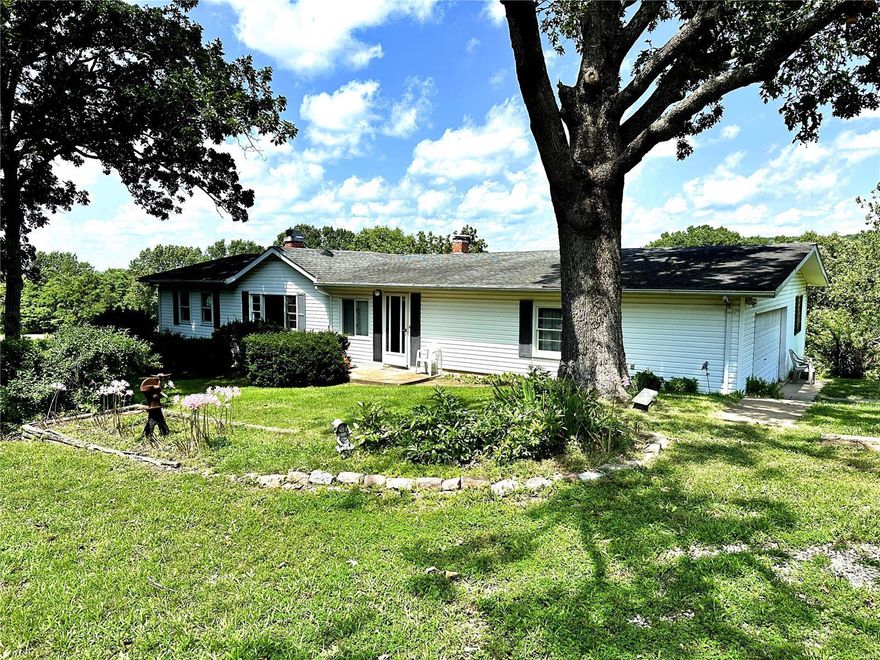 BEAUTIFUL farm-like setting, with over 80 acres of land at BANK-OWNED pricing!  Right off of Drake Lane, a private 0.5 mile drive through white fencing takes you through thousands of trees to an open prairie...and the existing 2 bedroom bungalow that overlooks the hills of Herron Farm.  Perfect property for a family retreat, estate, cattle and/or horses, recreation or farming.  Existing septic and well are on-site, and some fencing does exist on the property.  In addition to the functional 2 bedroom, 2 bath home; this property also features a metal lean-to, barn, and picturesque views like no other.  At this price, the owner is available to discuss the features and qualities of the property; and will be selling as-is with no repairs to be completed by the owner.  Showings by Appointment Only.