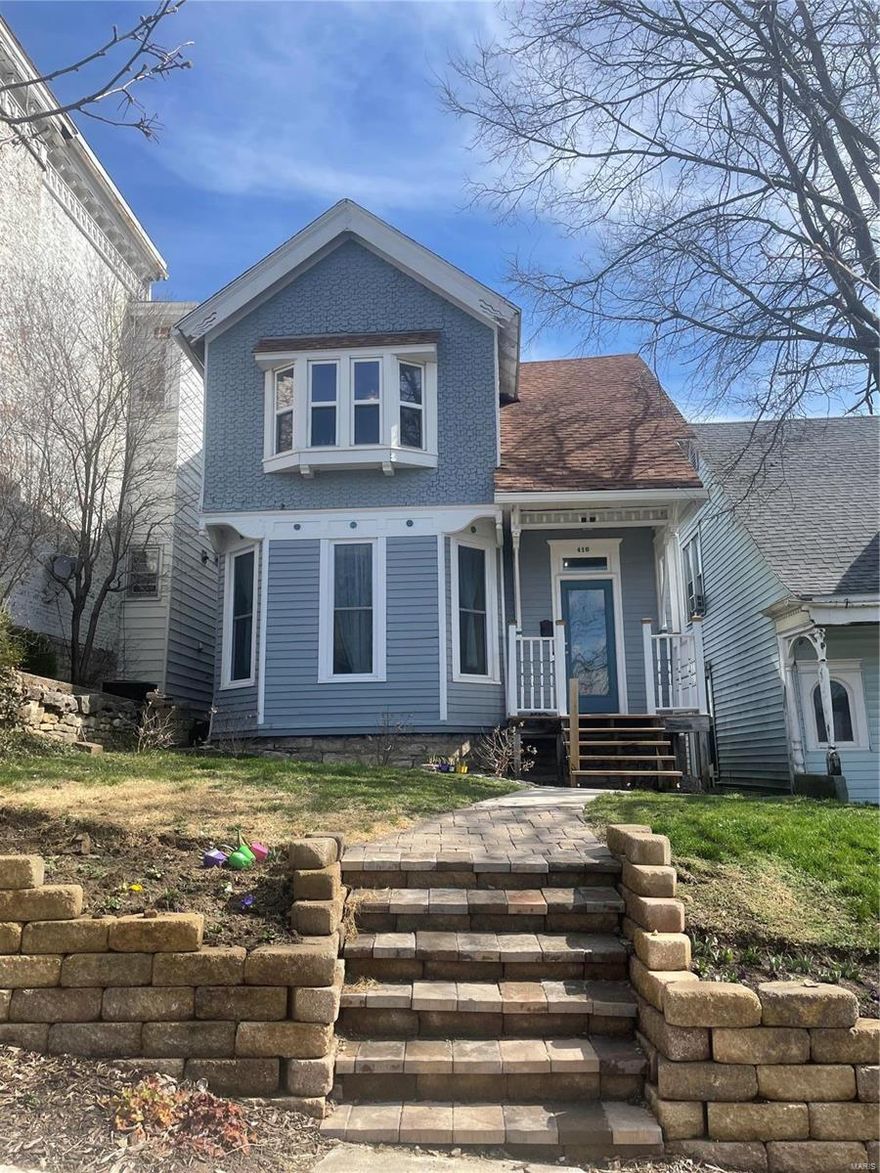 Located in Hannibal's historic downtown district, this 3 bed, 2 and a half bath, is ready to say, "welcome home". Newly renovated from top to bottom, this home offers new updates throughout! The kitchen offers a gas stove, an 8x5 walk in pantry, beautiful tile flooring, and new cabinetry from ceiling to floor. Off the kitchen you will find main level laundry and additional storage space, as well as a beautiful walk out deck to the backyard with a beautiful view of the Mississippi River! The original Victorian charm has been preserved and can be seen in the details, including the hardwood flooring on the main level, the fireplace in the family room, the trim around the doors and pocket doors, butlers pantry in the dining room and more! Upstairs, new flooring has been added to the entirety. All double pane windows have been added, allowing the most use of energy efficiency and best use of natural lighting! This home has a story to tell! Come take a look today!