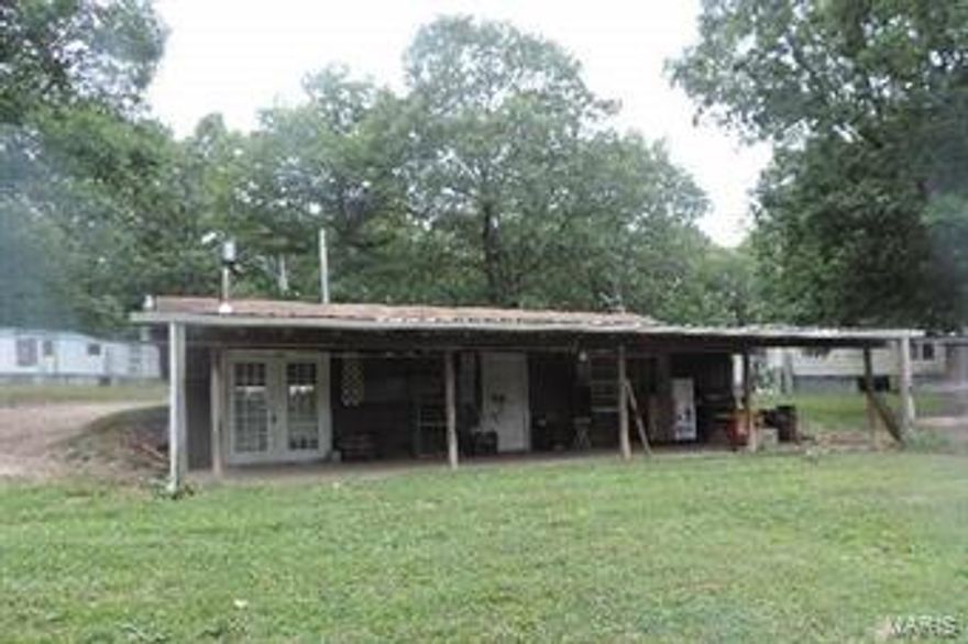 6.2 +/- acres suitable for horses or hunting. Property offers a 2 bedroom earth home with open living room and spacious kitchen. Enjoy the abundance of wildlife and privacy while relaxing on your covered front porch and watching all the wildlife roam. Enjoy the secluded scenery with plentiful trees and your own private driveway. Schedule an appointment to see this great property today. SpecialListingConditions: Foreclosure
