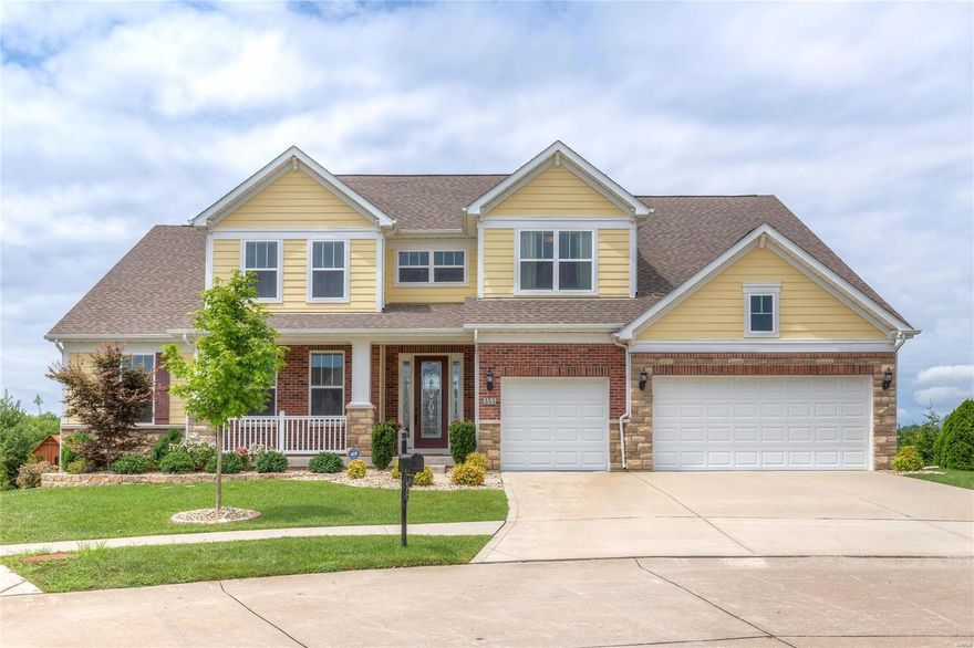 Exquisite 1-1/2 story home.  Beautiful attention to details & upgrades.  The 2-story foyer welcomes you with a beautiful ASIAN WALNUT flooring throughout the main level of the home.  The kitchen-great room share a see-thru gas fireplace with stacked stone surround. Gourmet Kitchen/breakfast area offers SS appliances including trash compactor, ice maker, gas cook-top & wine cooler complete for every cook’s dream. Planning Center area off the kitchen. Master suite has a "lounge area" between the Brdm & the master bath.  Upper level includes 3BR's, 2Ba, loft area & Media room with a wall of built-in cabinets. The walk-out lower level offers you space to entertain a large group - media area, Bedroom, bathrm, wet bar w/ice maker, frig and beer tap!  You can enjoy your backyard from your screened-in porch or deck.  Spacious & Impeccably kept - this home looks new!  Homes has appox. $200,000 in improvements. Enjoy your own Basketball court too! Ready for a new owner.  Convenient location.