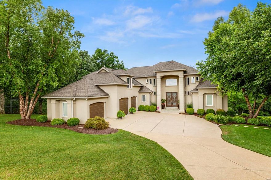 No showings while under contract. 4 bedroom St. Louis home featuring an amazing outdoor living area & equally impressive interior! Step inside to find the 2 story family room straight ahead boasting floor to ceiling windows offering great natural light & gorgeous fireplace flanked by built in shelving. The formal dining room leads to the well appointed kitchen featuring beautiful tile floors, center island, tile backsplash, granite counters, pantry, breakfast bar, built in desk & breakfast area w/ french doors leading to the deck overlooking inground pool w/ patio surround & offers scenic views of the woods behind the home. The luxurious master bedroom suite features 2 walk in closets & attached master bath w/ dual vanity, tub & glass brick shower. Step upstairs to find a jack & jill bath, bedrooms 2-3 each w/ WIC, office & bonus room. Head down to the finished lower level to find the theatre, exercise room 4th bedroom & recreation room w/ wet bar w/ custom counter & in wall fish tank.