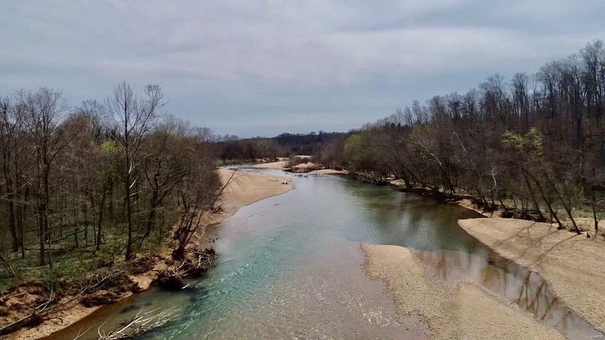 455 acre Castor River farm with over a half mile of frontage and 135+/- acres of pasture.