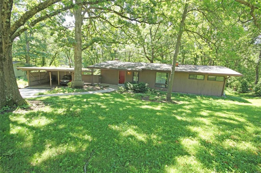 Charming mid century modern ranch in the desirable Craigwoods neighborhood. 4 bed and 3 full bathrooms on a great lot. Vaulted ceilings throughout the main floor with an open concept between the family room and dining room. The kitchen is located in the front of the home with the 3 bedrooms and 2 full bathrooms just down the hall. The master bedroom has some great closet space with its own full bath. The other 2 bedrooms are just across the hall and share the 2nd full bath. The basement is partially finished with a fireplace, rec/family room, bedroom, full bathroom and tons of storage in the unfinished area. Walk-out to the private backyard and patio great for pets or entertaining. The second patio is located just off the family room between the home and the 2 car carport. The carport has room for 2 vehicles with a nice storage shed for lawn equipment.