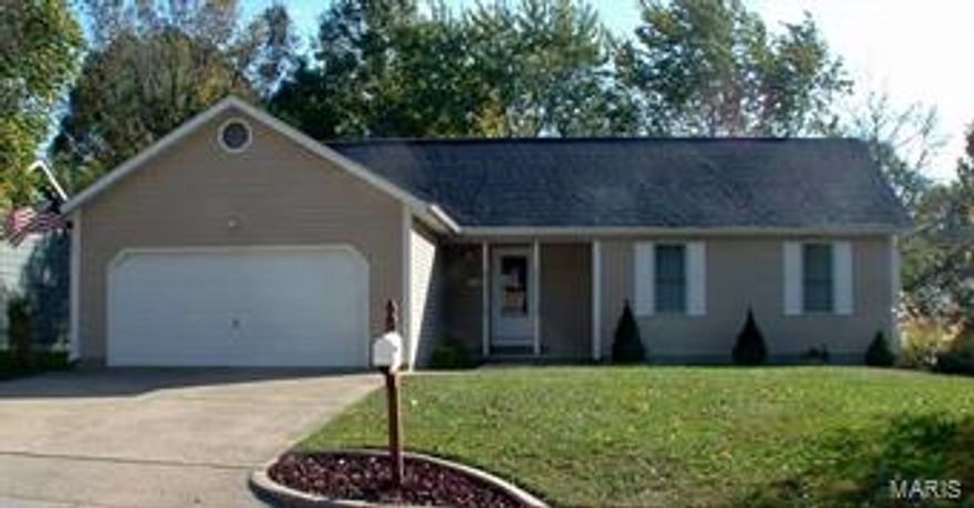 Really cute ranch home in a nice neighborhood.  Covered front porch, entry foyer with coat closet, living room with vaulted ceilings and windows overlooking the back yard.  Kitchen with great cabinet space, breakfast bar, dining has patio door that leads out onto the back deck.  The master bedroom has a private bath plus a big walk-in closet.  The other 2 bedrooms also have nice walk-in closets and a hall bath to share.  Utility room between the 2-car garage and the kitchen.  Pretty back yard with chain link fencing, huge deck with built-in seating and nice trees!  This is a great home, great location that's not too far from schools and shopping, ready to move into!