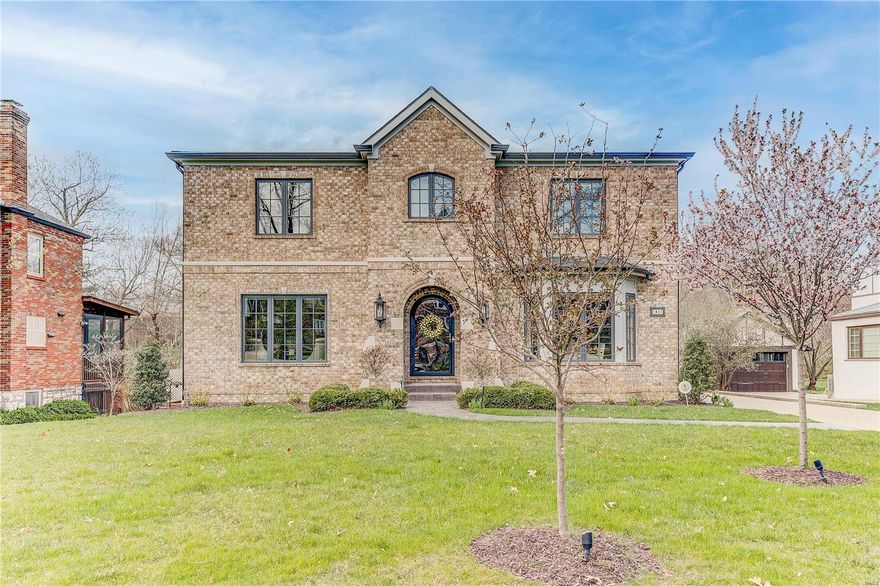 ELITE QUALITY & LOCATION! Remarkable 6yr old Higginbotham masterpiece situated in one of Clayton’s most prestigious neighborhoods! Entering the spacious foyer, the crisp clean interior conveys an elegant sun-drenched dining rm & skillfully appointed living rm showcasing a wall of bookcases & box beam ceilings. Open concept, superb millwork & hardwood FLRs, upscale lighting, striking staircase, & lavish finishes track flawlessly thru the main level. Designer kitchen w/vast center island, Wolf & SubZero appliances, adjoins the butler’s pantry, breakfast rm, & hearth rm (that overlooks the terrace & fenced rear yard). Beyond, custom mud rm ushers the oversized 2-car garage. Private ofc. & ½ BA complete main. Upstairs, a master suite awaits w/spa shower & bath, heated floors, & infinite closet space; plus (3) addt’l BRs, (2) full BAs, & 2nd FLR laundry. The LL has an extra family rm w/fireplace, BR, BA, gym, wine rm, bonus rm, mega storage, & so much more! Custom elevator serves all FLRs. Additional Rooms: Mud Room, Wine Cellar