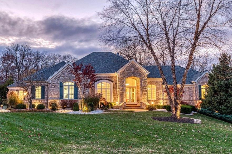 This spectacular Cross-built ranch home features over 7000 sq ft of living space enhanced by soaring ceilings, oak hardwoods & expansive windows with panoramic views. Impressive foyer with 14’ ceiling leads to study with built-in bookcase, formal dining room with cast stone fireplace & wet bar & stunning great room with floor-to-ceiling stone fireplace, granite bar & atrium door to screened porch. Designer kitchen is a chef’s delight with granite countertops, 42” white cabinetry, KitchenAid appliances & butterfly center island. Sumptuous master bedroom suite with His & Hers walk-in closets, sitting area with groin vault ceiling, luxury bath & private deck plus 2 additional bedrooms with Jack n’ Jill bath complete the main floor living quarters.  Walk-out Lower Level includes recreation room with fireplace, gathering bar, family room with entertainment center, workout room, 4th bedroom & 2 full baths. Situated on a 1+-acre cul-de-sac lot with deck, patio, fenced backyard & 3-car garage. Additional Rooms: Wine Cellar