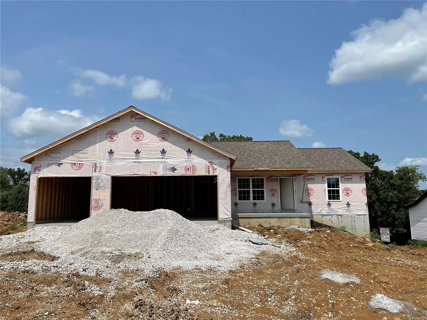 The "Breeana" model under construction features 1312 sq.ft. 3 bedroom divided floor plan, 2 baths and 3 car garage ranch home in a great community on nice lot that backs to trees. The open floor plan welcomes you with recessed can lights, vaulted ceiling in living room & master, brushed nickel hardware, and master bedroom with full bathroom. Enjoy the main floor laundry/mud room, walk in master closet, and the views from your large front porch. The full walkout basement includes a sliding glass door, window, and bathroom rough in for your future finished expansion. The exterior of home features maintenance free vinyl siding, upgraded garage doors with windows, and patio for your entertaining needs. VA, FHA and USDA zero down financing eligible home.
Estimated completion is October 2021.