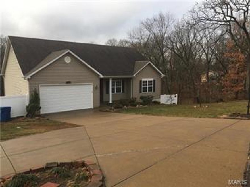 This home is a must see and is ready to move in!! This Beautiful Ranch Home on over an acre Lot has 3 Bedrooms, 2 Bathrooms and  offers an open floor plan with vaulted ceilings, a wood burning fireplace, Hardwood flooring, and an updated kitchen with new counter tops, tile backsplash, and an island along with main floor laundry. This home also has new carpet in the bedrooms, fresh paint throughout, new water heater, walk-out basement that opens to a new concrete patio and pool!