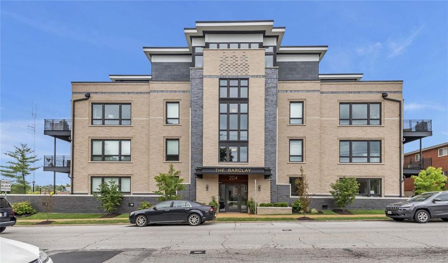 Luxury awaits in this like new 2 bed + den condo w/ over 1800 sf in the heart of Kirkwood! The beautiful building entry leads to the elevator taking you to the 1st floor entrance. A stunning foyer w/ rounded wall opens to large open floor plan. The kitchen features custom cabinetry w/ center island, tile backsplash, gas cooktop, double ovens, built in microwave & SS fridge. The dining area is open to the kitchen w/ custom chandelier. The expansive LR features floor to ceiling windows & fireplace w/ built in shelving & wood mantle. Off the LR is a den, perfect for an office/library. The sunlit master suite features floor to ceiling windows w/ a view of the balcony, large bathroom w/ double sinks, walk in glass shower & customized closet. A second bedroom w/ double closets & full bath w/ tub/shower combo complete the unit. Relax on your large balcony, in view from main living areas & master suite. Hardwood flooring throughout, recessed lighting, 2 assigned parking spaces & storage unit. Location: Corner Location