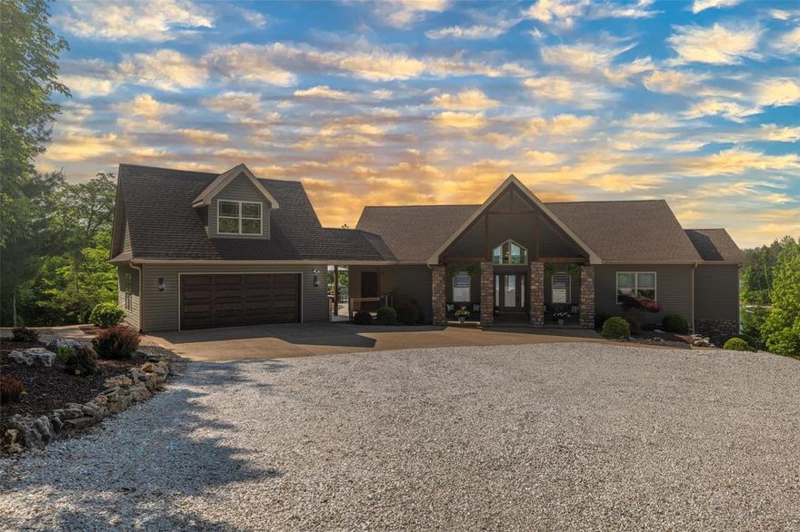 Exquisitely remodeled from top to bottom. Turn Key Professionally decorated with all new furnishings. 
Perched on 228+ feet of shoreline on Alpine Lake,  5 bed, 4 full bath home defines luxury lakeside living. 
Floor to ceiling windows overlooking the lake welcome you into the open main level layout, enhanced by an oversized stone wall fireplace and stunning chef’s kitchen featuring a 9 foot center island, professional appliances, coffee bar and sliding glass doors to the deck, where outdoor dining pairs perfectly with picturesque panoramas. Custom tiled showers and floors add a high-end touch to each of the 4 bathrooms, while 5 generously sized bedrooms offer their own lakefront views.
Ideally suited for entertaining and pampering overnight guests, the walkout lower level includes a custom wet bar, games, and comfortable seating. Just outdoors, gather on the flagstone patio, lounge on the private sand beach, or enjoy views of the uninterrupted Innsbrook sky by the fire pit. Additional Rooms: Mud Room