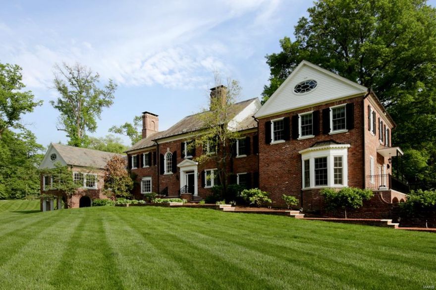 NEW PRICE! OVER $400,000 OFF ORIGINAL PRICE! GREAT CONDITION-GREAT LOCATION-GREAT PRICE! Totally updated classic Ladue home designed by Gale Henderson plus a 2 bedroom guest house. Main house features signature architectural features including front entry palladium window, French doors, custom casework with multiple bay windows, southern exposure, spiral staircase & herringbone flooring. Center island kitchen with granite, Thermador, Bosch, Subzero, Fisher/Paykel dishdrawer, Butler's pantry with 2nd sink & beverage cooler. Master suite with sitting room, his & her dressing rooms, luxury bath with steam shower & office. Wet bar accessed from both living room & library. 3rd floor with play/TV area, built in beds & bunks, full bath & wrapping/hobby room. Spacious family room, main floor laundry, 5 fireplaces, large basement walk out rec room & 3-car garage. Guest cottage rebuilt in 2008 has kitchen, living room, full bath, laundry, 2 upper level bedrooms, 4th garage & full basement.