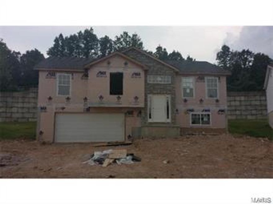 3 bed/ 3 bath Split level with vaulted ceilings, birch cabinets, crown molding, staggered stainless steel appliances. 
There is mian floor laundry, a master suite with separate shower and tub. There is a 14x12 finished room in the lower level. 
Oversized garage and a 10x20 patio