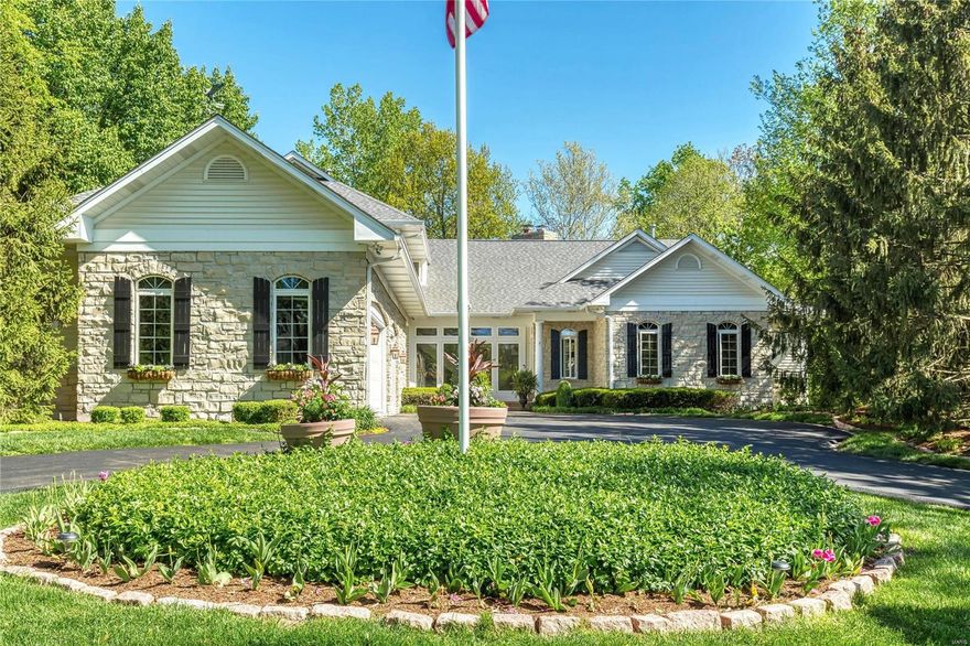 Spectacular stone 1.5 Sty beautifully renovated & redesigned! Open floor plan features hardwood & slate flooring, expansive windows, custom built-ins & integrated sound system. Impressive slate foyer leads to paneled study with beamed ceiling & built-in bookcases & vaulted great room with floor-to-ceiling fireplace & gathering bar. Exceptionally large kitchen with 42” maple cabinetry, granite countertops, premium appliances & 9’ center island adjoins light-filled dining room & hearth room with wide plank pine flooring & full-height fireplace. Sumptuous master bedroom suite combines the enjoyment of a stone fireplace with customized walk-in closet & marble bath. The 2nd floor extends the living quarters with 3 additional bedrooms, 1 with ensuite bath & 2 with Jack n’ Jill bath, plus bonus room. Lower Level includes game room, media room, 2nd kitchen, workout room, guest suite & wine cellar. Atrium doors open to outdoor living room with fireplace & pool surrounded by landscaped gardens. Additional Rooms: Wine Cellar