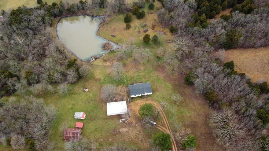 Come home to this gorgeous property MINUTES from St James city limits! This home features 3 bedrooms all with large closets and 2 bathrooms sitting on approx 8.05 acres with a 1 acre m/l LAKE in the backyard. Open concept flow throughout the living room, dinging room and expansive kitchen with ample cabinets and a center island. Laundry room located off the kitchen leads out to side deck. Divided bedroom floor plan with the master bedroom off the living room. Attached master bathroom suite features separate tub and shower with walk in closet. Off the dining room you'll find access to the back deck with a peaceful view of the lake that is stocked with bluegill, crappie, bass, and perch. Property also boasts a 30x50 shop with gravel floors and electric. Original barn to the property still stands and is great for storage. Call today to view! Additional Rooms: Mud Room