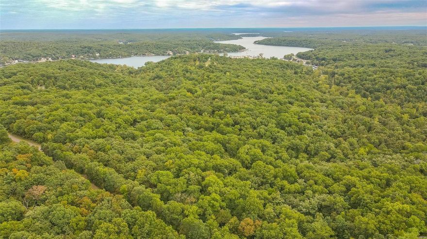 Here is a great opportunity to own 18 +/- acres at Lake of the Ozarks. Although not located directly on the water, here you will be close enough for all the lake fun you might desire. Gravois Mills boat ramp is only 1.5 miles away. You will be close to restaurants, convenience stores, and multiple lake attractions on the west side of the lake. Whether you are looking to build, or to have a small hunting and recreational tract, this piece of ground sets up very well for both. This land will give you the feeling of seclusion as it is tucked away in a great location surrounded by timber. There are 2 great build sites along with natural gas, Co-Mo high-speed fiber optic internet, cable, and electric access. If you are in search of an affordable piece of property, this could be it. Come check it out today.