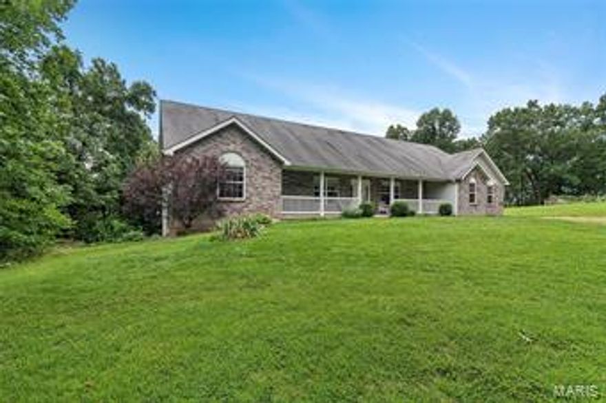 Beautiful brick elevation, covered porch, side entry 3 car garage atrium ranch sitting on a peaceful 5+ acre lot! As you enter this home you are greeted with a spacious open floor plan, custom inverted vault ceiling & neutral decor. The kitchen offers custom cabinetry with crown molding, tile floor, breakfast bar, stainless steel appliances & an adjoining breakfast area with fireplace & convenient access to the multi-level deck & private wooded back yard perfect for hunting! The main floor master suite offers vaulted ceiling, walk in closet & luxury master bath with double sink, separate shower & jetted tub! 2 additional bedrooms, 2nd full bath, main floor laundry & 4 seasons room complete the main floor. Additional living space can be found in the walk out finished lower level with family room, exercise room, 4 legal bedroom & full bath! The property is just minutes form a public golf course! Don't miss your opportunity to own this private get away! Additional Rooms: Mud Room