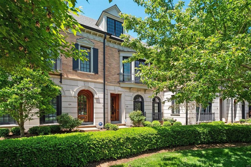 Resting in the heart of Clayton, this sophisticated townhome is walkable to shopping, dining and work!  Classic and elegant architecture is celebrated with expansive and arched windows, soaring ceilings, elaborate millwork, and Brazilian cherry flooring. The first floor's formal living and dining rooms flow effortlessly into an open concept kitchen/hearth room, and open to a private patio.  On the second floor are a gracious primary suite with a large bay window, French doors and a marble bathroom with a customized walk-in closet.  Additionally, there are two guest bedrooms, a full bathroom, laundry room, and storage.  On the third floor are a recreation room, bedroom, full bath and storage.  The lower level hosts a fitness center, work/hobby room, storage and three parking spaces.  The home was designed with floor framing to accommodate an elevator from the lower level to the first & second floors.  Meticulously maintained with newer systems, this home represents an excellent value! Location: Suburban