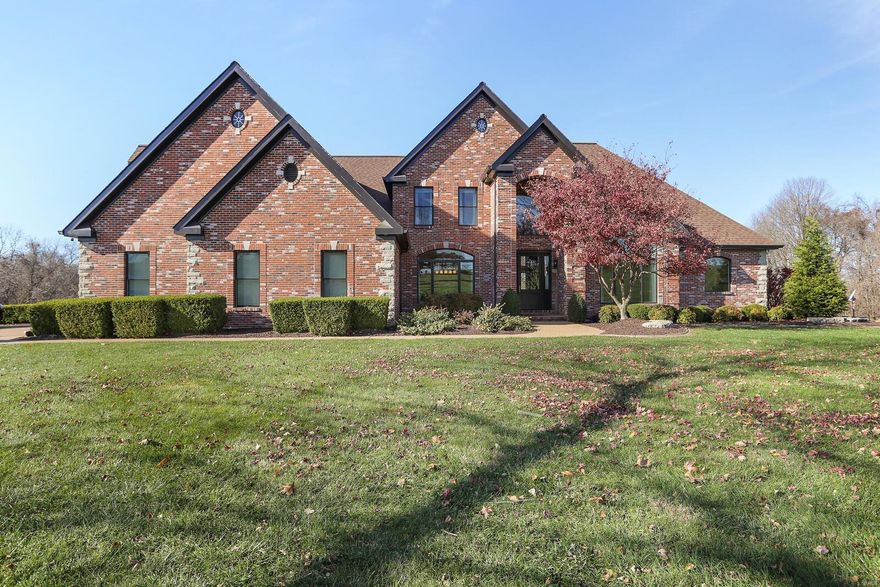 A Breath of Fresh Air! This elegant 1.5 story home situated on 11.17 +/- acres backing to a peaceful setting w/Heated INGROUND POOL w/electric cover. Enter into this marvelous foyer, flanked by a formal dining room & a lovely office following into the great room w/gas fireplace, built-in book shelves & beautiful Palladian windows. The kitchen layout was designed for entertainment offering 42" custom cabinets, walk-in pantry, backsplash, planning desk, breakfast bar & breakfast room. Cozy hearth room w/gas fireplace. Fanciful screened-in deck w/electric shades, built-in hood for grill & stone fireplace. Main floor master suite w/2 walk-in closets, dazzling full bath w/his & her vanities, jet tub & separate shower. Spacious laundry rm. Upper level finds you 2 bedrooms w/adjoining jack & jill bathroom, 3rd bedrm & massive bonus room. Finished walk-out LL w/gas fireplace, wet bar, family/rec area, en suite, theater room, 1/2 ba & exercise room. Covered patio, 3 car garage w/storage. Additional Rooms: Sun Room