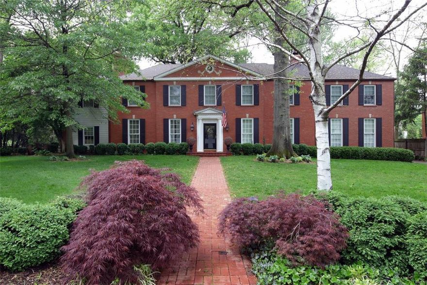 Breathtaking & elegant Hacienda 4 bedroom & 3.5 bath home that has been tastefully renovated throughout.  The updated kitchen features custom cabinetry, granite countertops & Viking appliances.  Off the the kitchen is the light & bright dining room.  The living room is gracious w/ floor to ceiling windows, wood floors, & a see through fireplace to the beautifully paneled den that walks out to the new sport court. The large main floor family room addition has a 2nd gas fireplace, hardwood floors, plantation shutters, a "hide away" office closet, & french doors leading to the charming brick patio.  Upstairs there is a stunning master bedroom w/ coffered ceilings & 2 walk in closets. The beautiful bath has marble double sinks, linen closet, & custom cabinetry.  The 3 additional large bedrooms all have professional closets & both baths are updated.  Amazing 2nd floor laundry!  The finished LL is nice for kids & offers more space.  Newer zoned systems, roof, windows, electrical & plumbing.