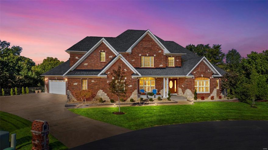 Elevate your living experience in this custom 1.5 story all-brick home with stone accents, over one acre private wooded lot, oversized four car garage w/8 240V outlets for workshop/EV ports. This 8 yr new stately home is raised to new heights with $400,000+ in recent upgrades with over 6300 living sq ft! Impressive kitchen upgrades: 5-burner wolf gas cooktop, double ovens, drawer microwave, coffee bar w/filtered waterline, counterdepth frig, island, prep sink, accent cabinetry! 19ft Ceiling in great rm, hearth rm + private office & wood screened porch. Primary bedrm includes coffered ceiling, granite topped dual vanities, whirlpool, two walk-in closets w/ mahogany stye organizers- one with counter/cabinetry & iron board. Walkout lower level shines w/wine room w/humidor, bar w/ice maker, wine & beverage refrigerators, gas fireplce, family rm, rec rm, 4th full bath, glass walled gym! Notables: 3 fireplces, arched drways, wood flrs thruout 1st -2nd flrs,4 hvac systems! Don't miss out! Additional Rooms: Wine Cellar