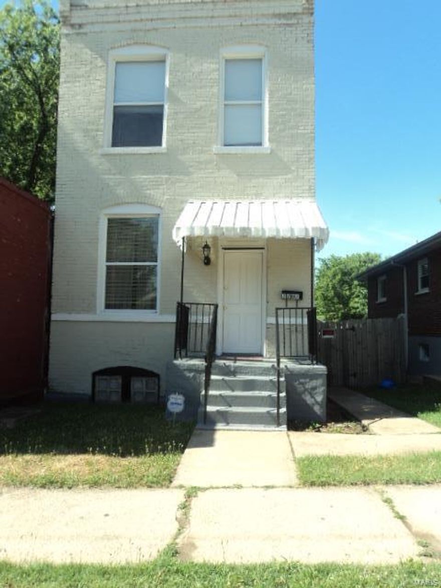 This 3 bedroom 2 bath home awaits its new homeowner! Newly rehabbed with fresh paint throughout, wood laminate flooring on the main level in the living room/dining room combo; ceramic tile in kitchen and bath. Upstairs you will find newer carpet, a divided bedroom floor plan and a full bathroom with newer fixtures. The walkout basement features a rec room for additional entertaining space. There is a wooden deck off of the kitchen. A large privacy fenced yard and a 2 car detached garage for off street parking. Come see all this home has to offer your family.