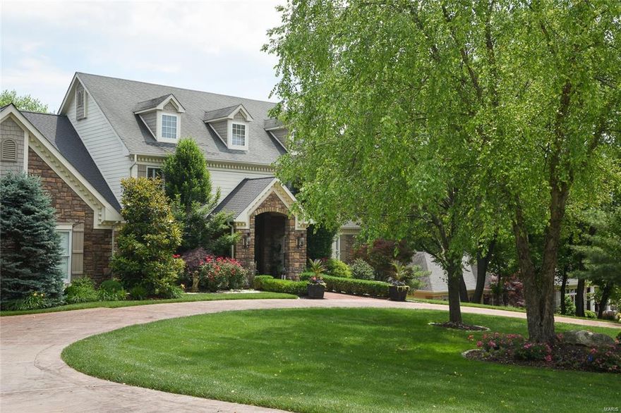 Custom exquisite 1-1/2 story Home in Town & Country.  Country French decor at it's best.  Lg eat in kitchen w/solid surface counter tops.  Extensive breakfast bar area.  Double Sub Zero Refrigerators 2 Asko Dishwashers,2 appliance garages, Wolf gas stove, hardwood flooring.Kitchen adjoins 3 seasons room with fplc, with Phantom retractable shades, blt in TV. Great rm but in bookcases, stone plc, valued ceiling, hardwood fl, built in wine cooler bar area, sub zero in bar area, ice maker. Dn Rm coved ceiling extensive mill work, hardwood fl.Main fl. laundry w seating area, folding ironing board, slop sink.  Living rm, stone plc, vaulted ceiling, Main fl master bedroom coffered ceiling, extensive mill work, his/her closets, adjoins master bath 2 separate sinks, makeup area Kohler designer series sinks, separate tub and shower, Jacuzzi tub.  Curved staircase, front and back staircase. Mn floor den w/blt in bookcases. In ground pool, fplc outside, hot tub. Circle Driveway. Finished LL